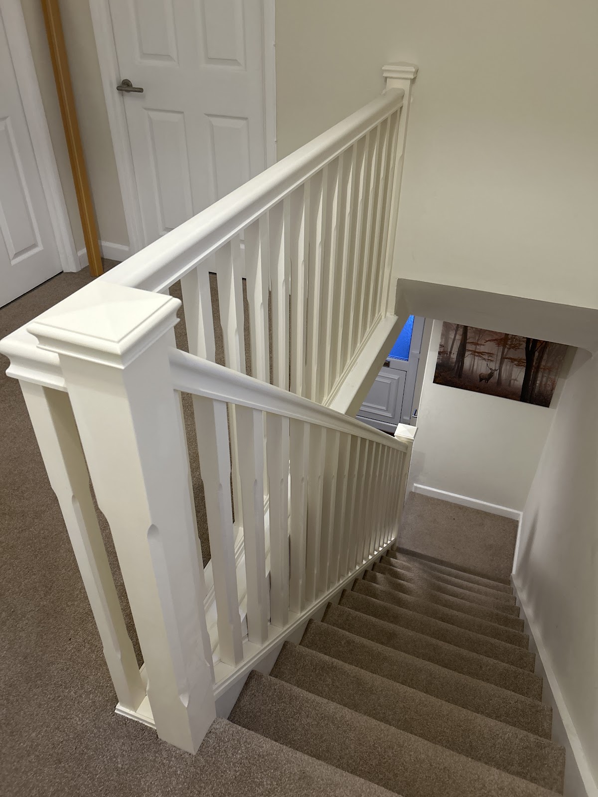 White painted spindle staircase and landing
