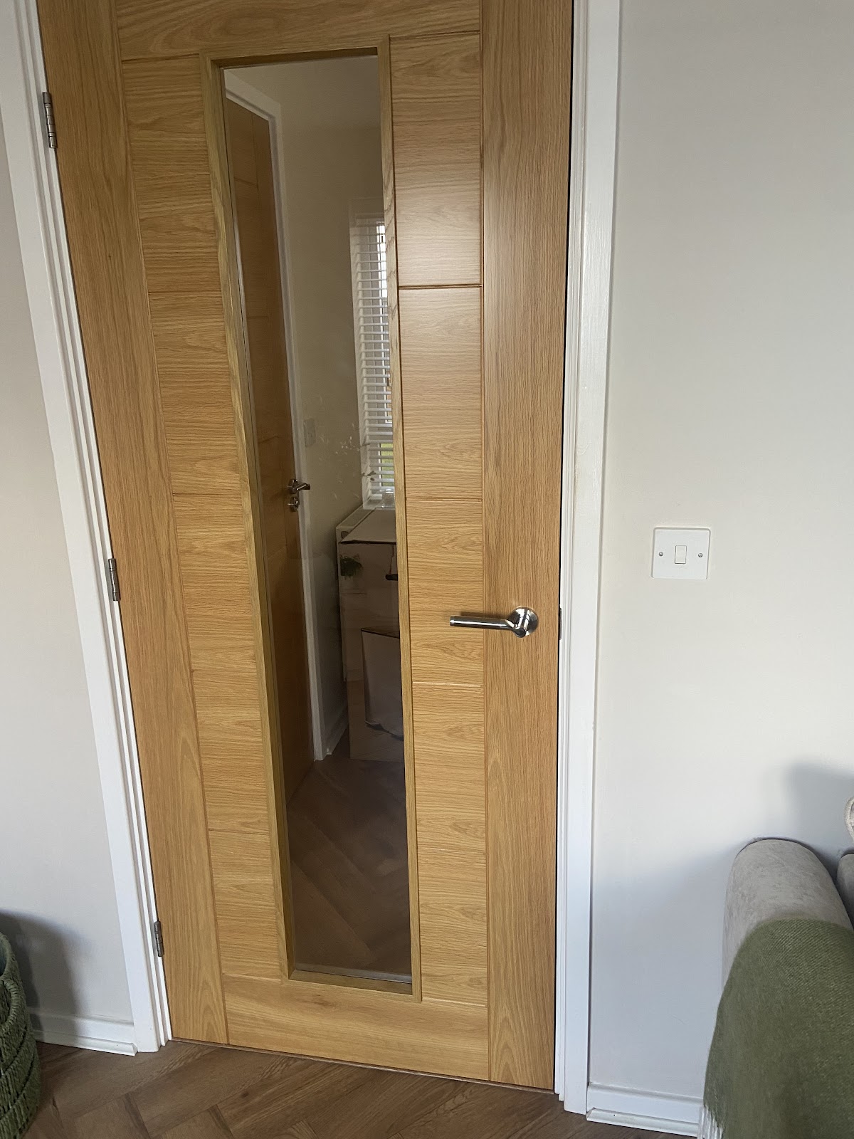 Oak internal door with a glazed vertical panel